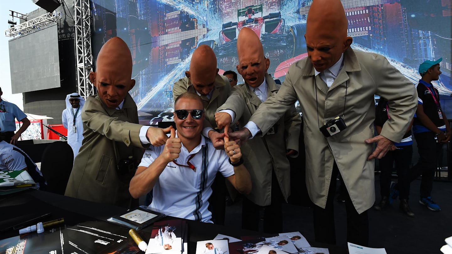 Valtteri Bottas (FIN) Williams and coneheads at the autograph session at Formula One World Championship, Rd21, Abu Dhabi Grand Prix, Race, Yas Marina Circuit, Abu Dhabi, UAE, Sunday 27 November 2016. © Sutton Images