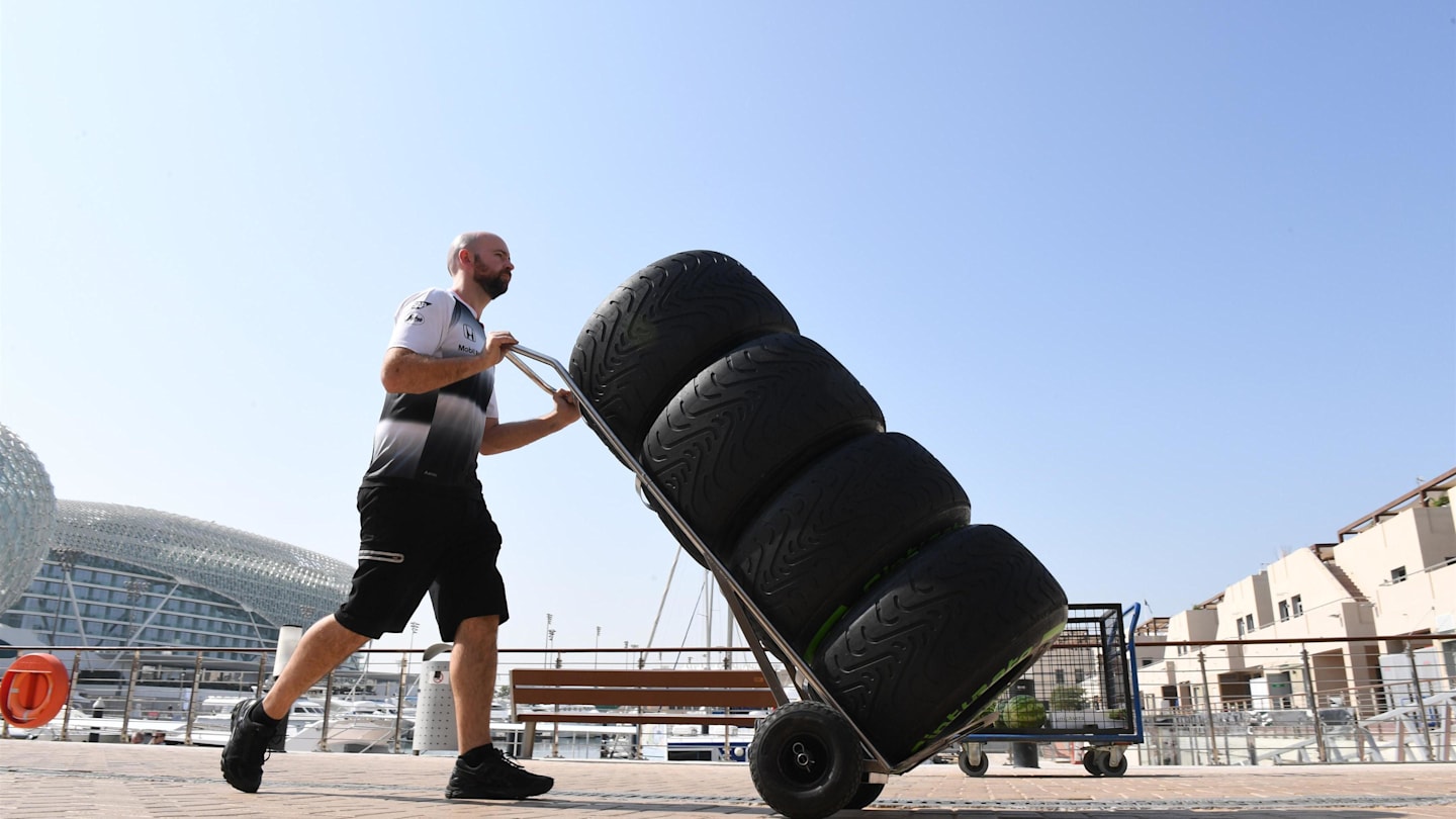 McLaren mechanic and Pirelli tyres at Formula One World Championship, Rd21, Abu Dhabi Grand Prix, Preparations, Yas Marina Circuit, Abu Dhabi, UAE, Thursday 24 November 2016. © Sutton Images