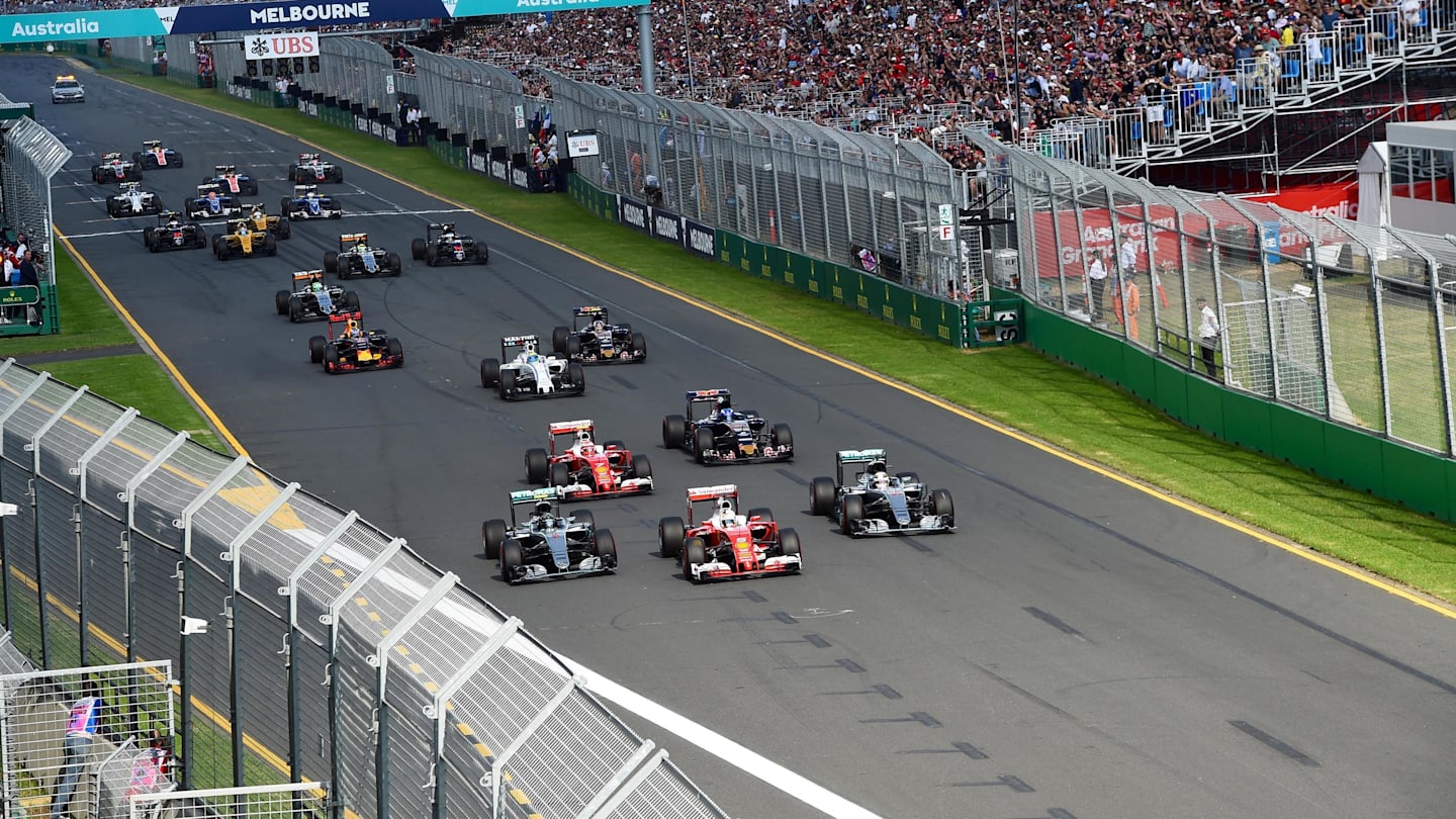 Sebastian Vettel (GER) Ferrari SF16-H leads Nico Rosberg (GER) Mercedes-Benz F1 W07 Hybrid and