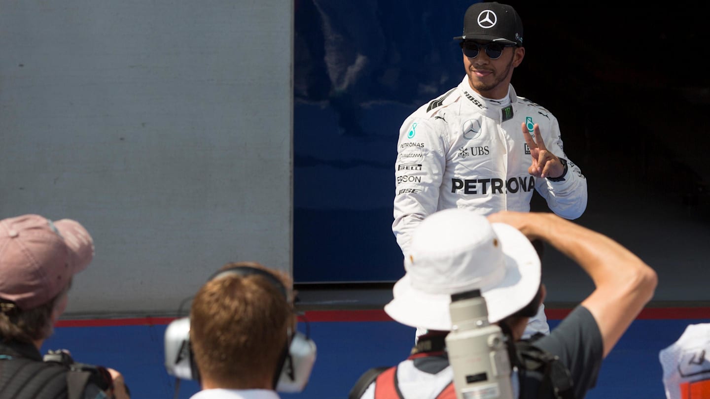 Pole sitter Lewis Hamilton (GBR) Mercedes AMG F1 celebrates in parc ferme at Formula One World