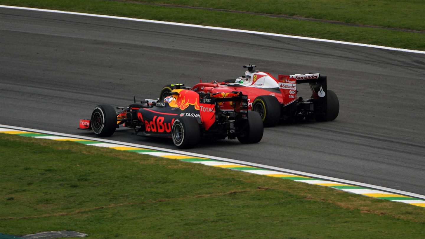 Sebastian Vettel (GER) Ferrari SF16-H and Max Verstappen (NED) Red Bull Racing RB12 at Formula One