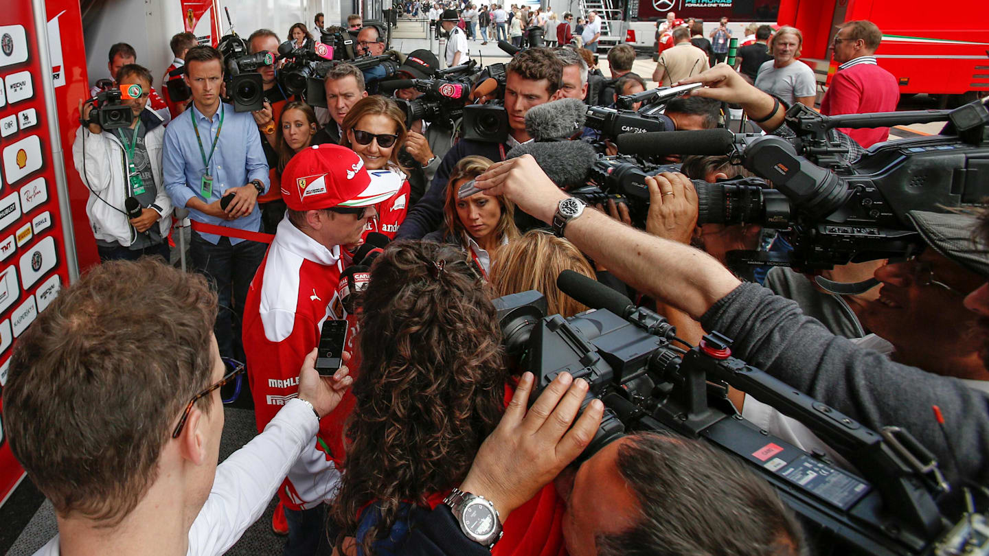 Kimi Raikkonen (FIN) Ferrari t5alks to the media at Formula One World Championship, Rd10, British