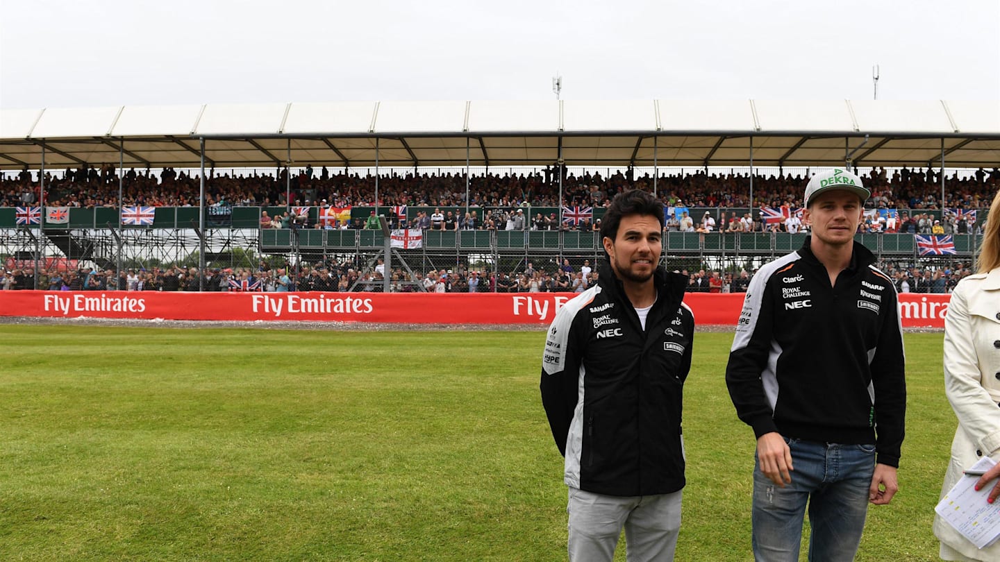 Sergio Perez (MEX) Force India and Nico Hulkenberg (GER) Force India F1 at Formula One World