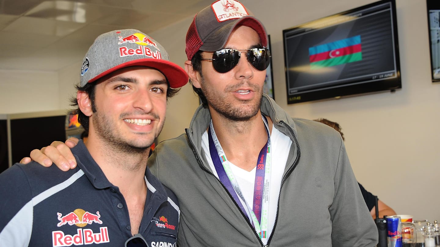 Carlos Sainz jr (ESP) Scuderia Toro Rosso with Enrique Iglesias (ESP) at Formula One World