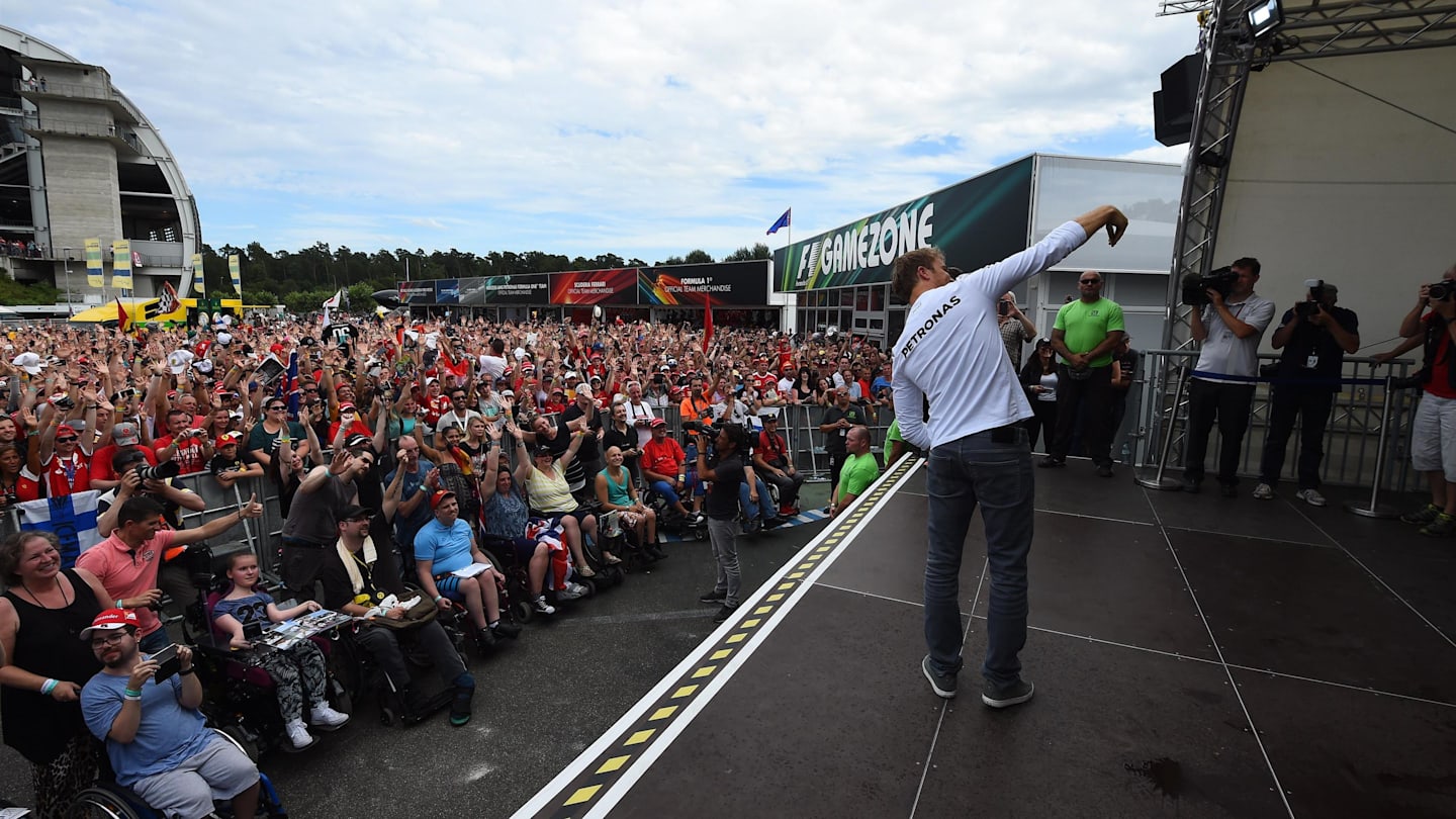 Nico Rosberg (GER) Mercedes AMG F1 poses for a selfie photograph with the fans at Formula One World