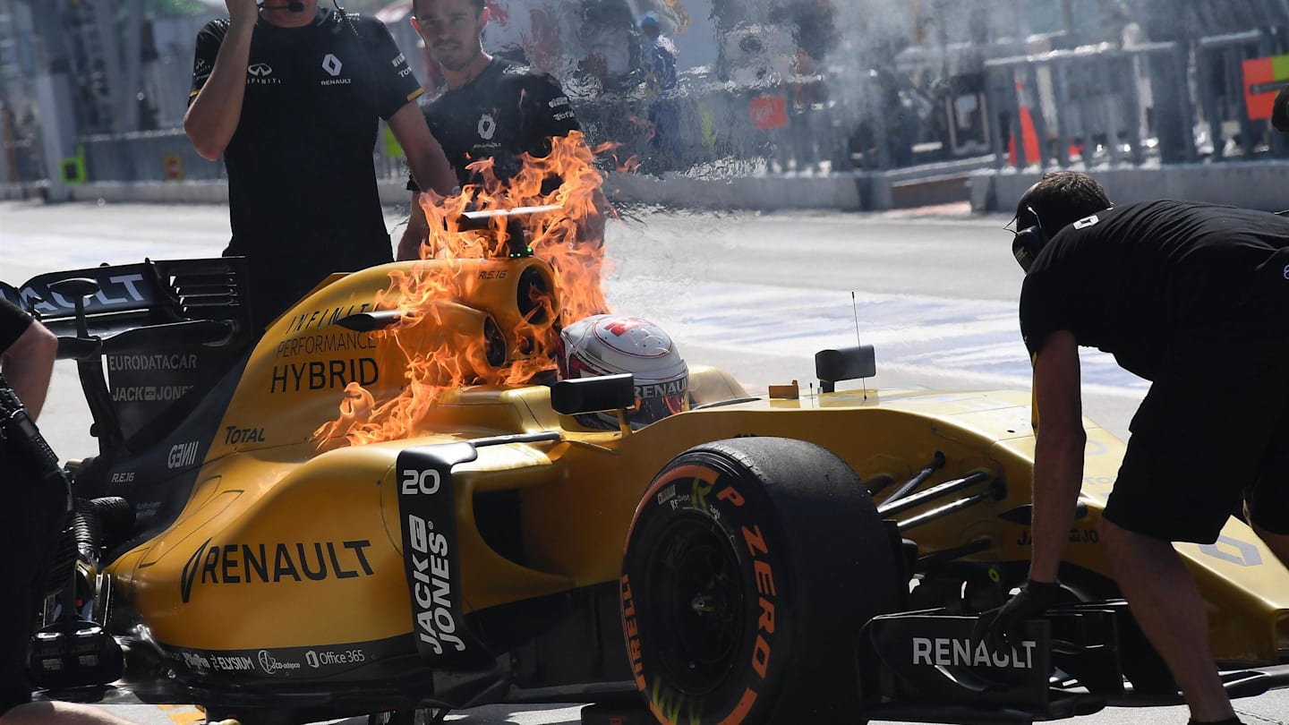 Kevin Magnussen (DEN) Renault Sport F1 Team RS16 on fire in pit lane during FP1 at Formula One World Championship, Rd16, Malaysian Grand Prix, Practice, Sepang, Malaysia, Friday 30 September 2016. © Sutton Images