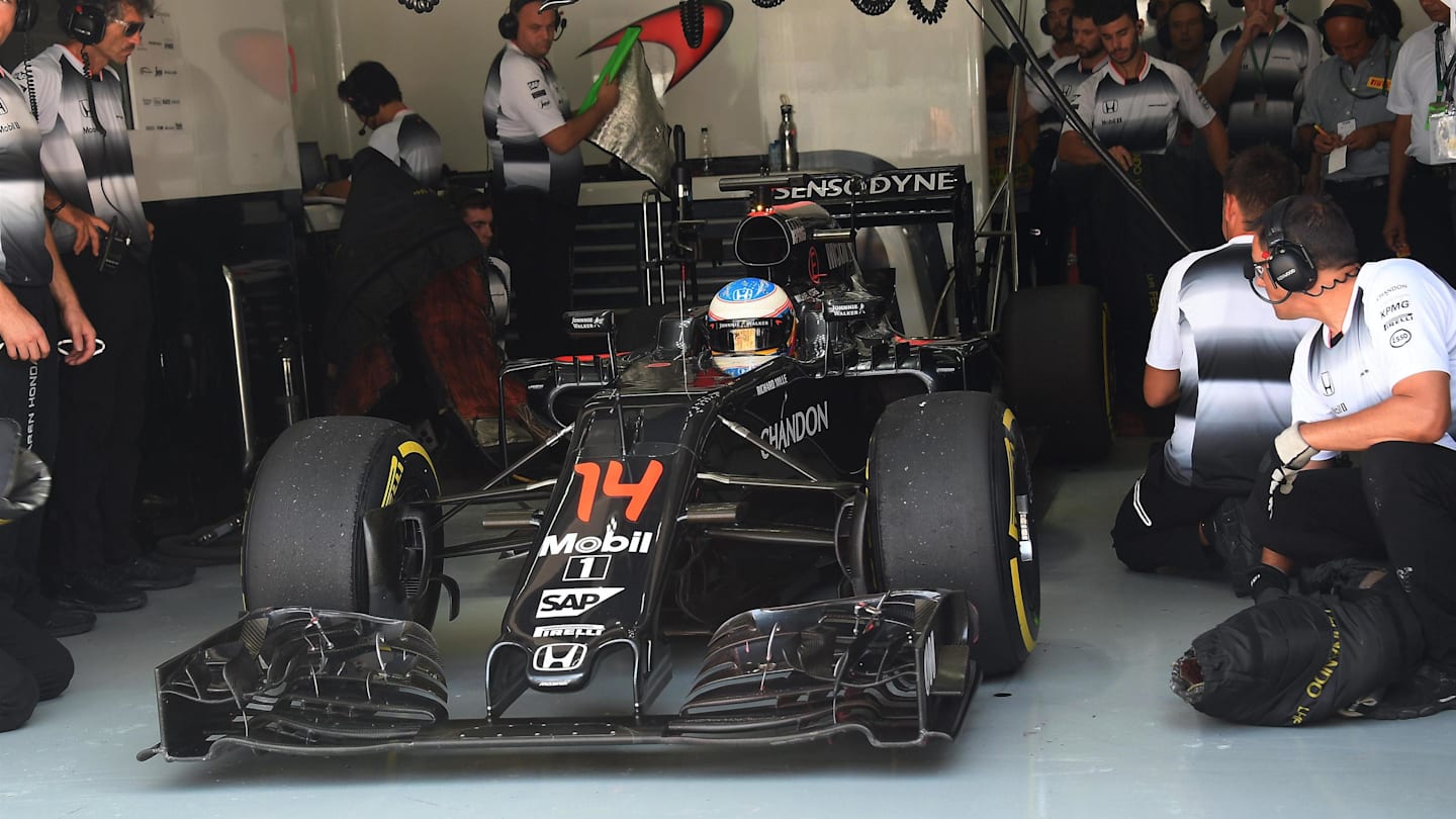 Fernando Alonso (ESP) McLaren MP4-31 in the garage at Formula One World Championship, Rd16, Malaysian Grand Prix, Practice, Sepang, Malaysia, Friday 30 September 2016. © Sutton Images