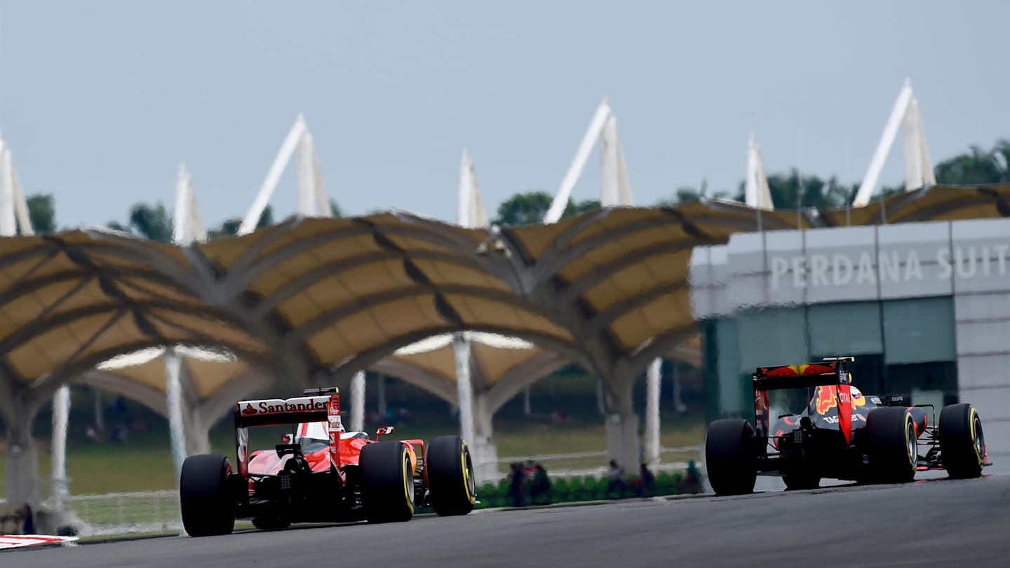 Max Verstappen (NED) Red Bull Racing RB12 and Kimi Raikkonen (FIN) Ferrari SF16-H at Formula One