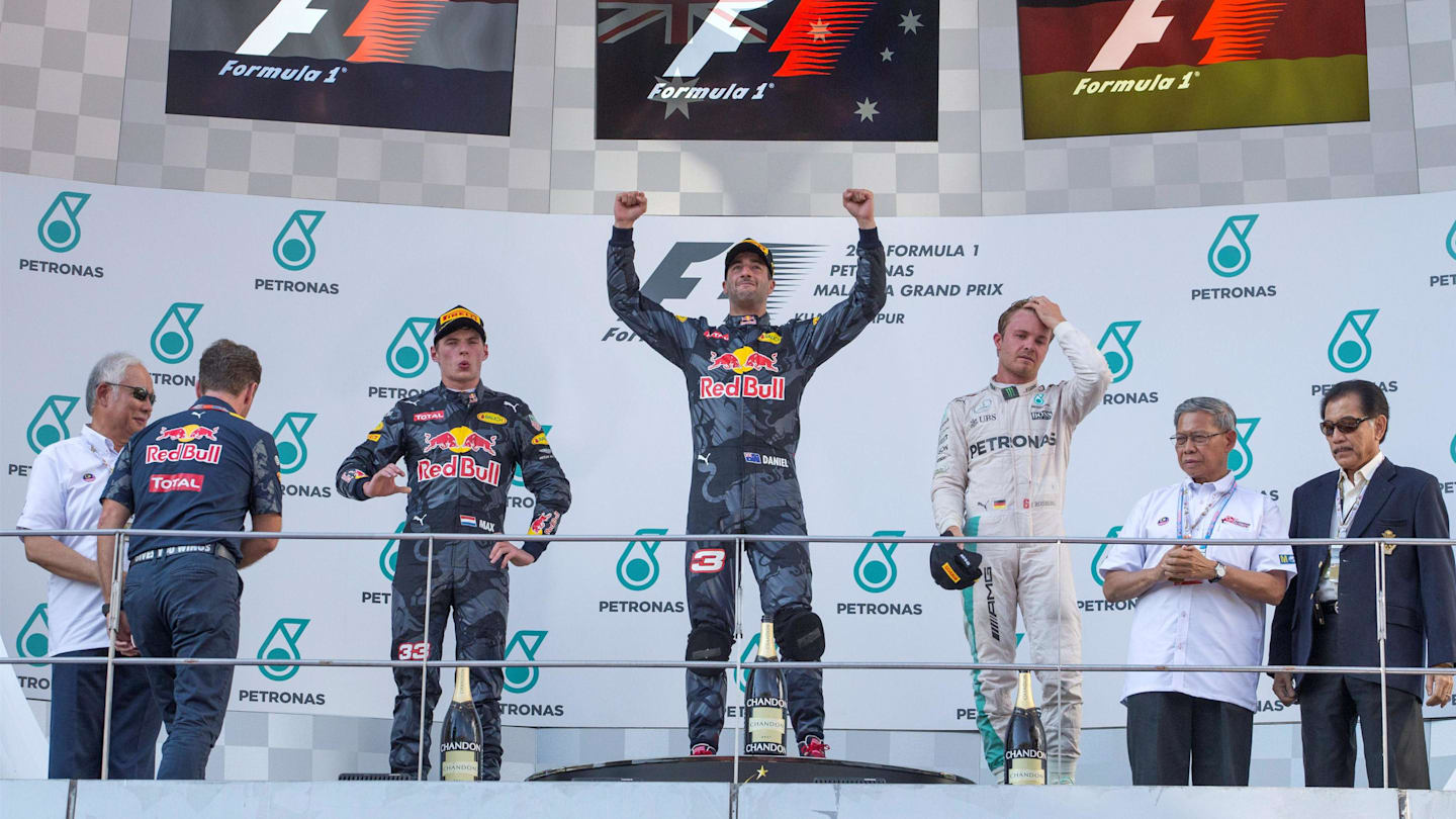 Christian Horner (GBR) Red Bull Racing Team Principal, Max Verstappen (NED) Red Bull Racing, race winner Daniel Ricciardo (AUS) Red Bull Racing and Nico Rosberg (GER) Mercedes AMG F1 celebrate on the podium at Formula One World Championship, Rd16, Malaysian Grand Prix, Race,  Sepang, Malaysia, Sunday 2 October 2016. © Sutton Images