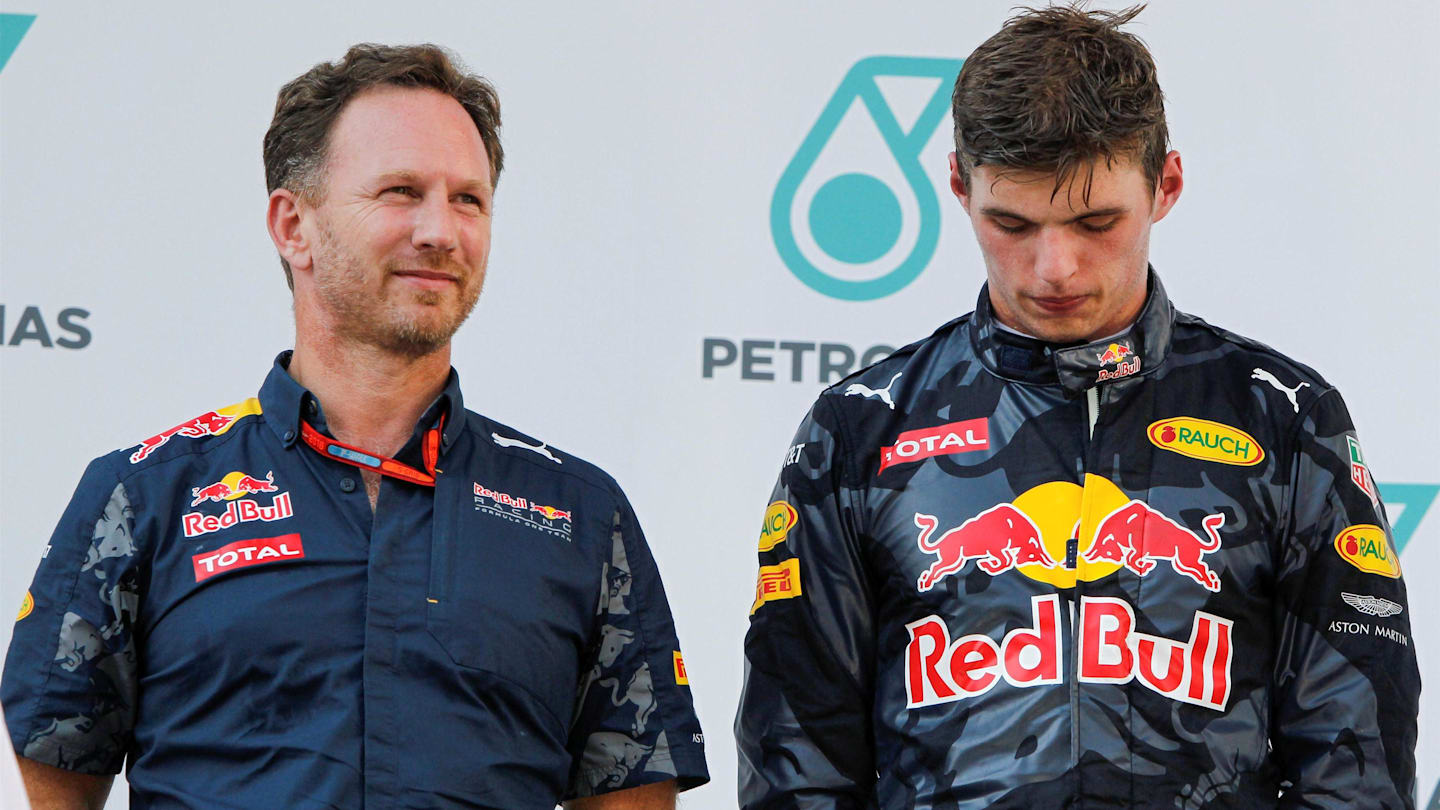 Christian Horner (GBR) Red Bull Racing Team Principal and Max Verstappen (NED) Red Bull Racing celebrate on the podium at Formula One World Championship, Rd16, Malaysian Grand Prix, Race, Sepang, Malaysia, Sunday 2 October 2016. © Sutton Images