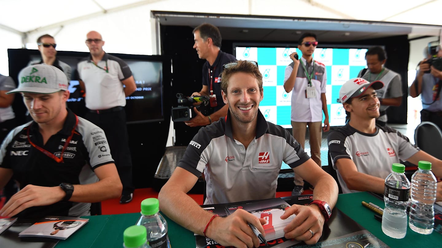 Romain Grosjean (FRA) Haas F1 at the autograph session at Formula One World Championship, Rd16, Malaysian Grand Prix, Race, Sepang, Malaysia, Sunday 2 October 2016. © Sutton Images