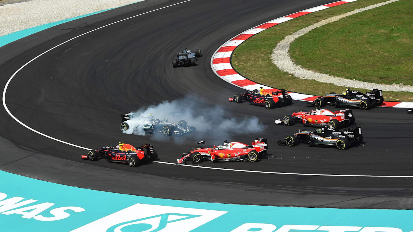 Lewis Hamilton (GBR) Mercedes-Benz F1 W07 Hybrid leads at the start of the race as behind Sebastian