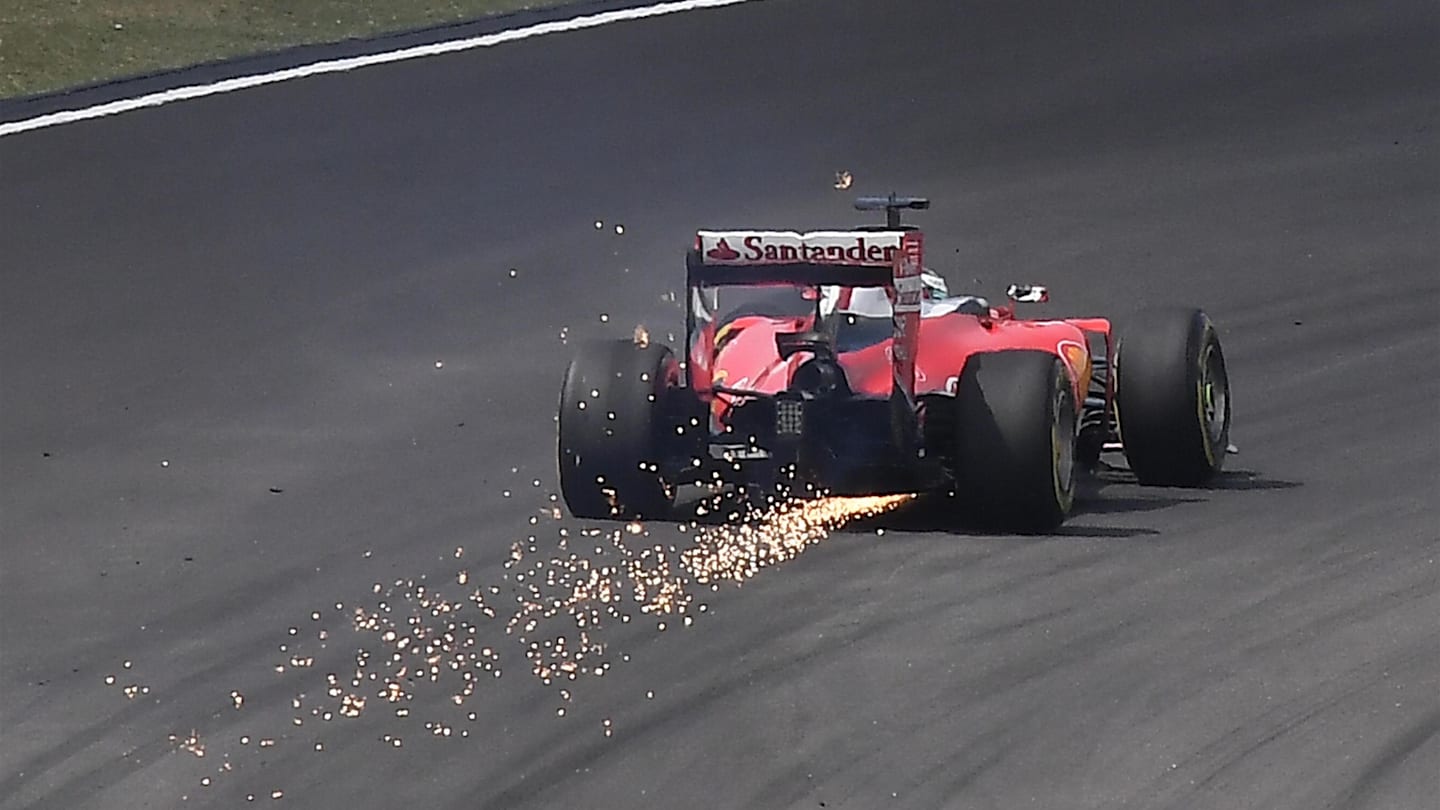 Sebastian Vettel (GER) Ferrari SF16-H with damage at the start of the race at Formula One World Championship, Rd16, Malaysian Grand Prix, Race, Sepang, Malaysia, Sunday 2 October 2016. © Sutton Images