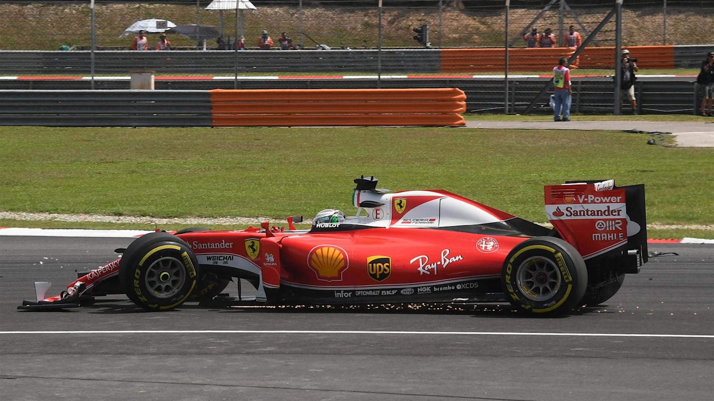 Sebastian Vettel (GER) Ferrari SF16-H with damage at the start of the race at Formula One World Championship, Rd16, Malaysian Grand Prix, Race, Sepang, Malaysia, Sunday 2 October 2016. © Sutton Images