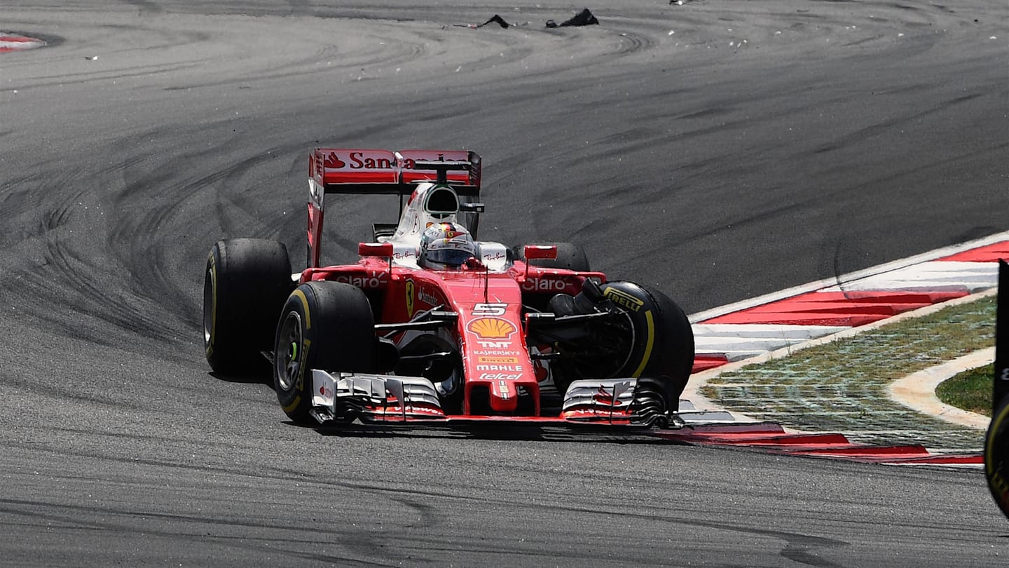 Sebastian Vettel (GER) Ferrari SF16-H with accident damage at the start of the race at Formula One World Championship, Rd16, Malaysian Grand Prix, Race,  Sepang, Malaysia, Sunday 2 October 2016. © Sutton Images