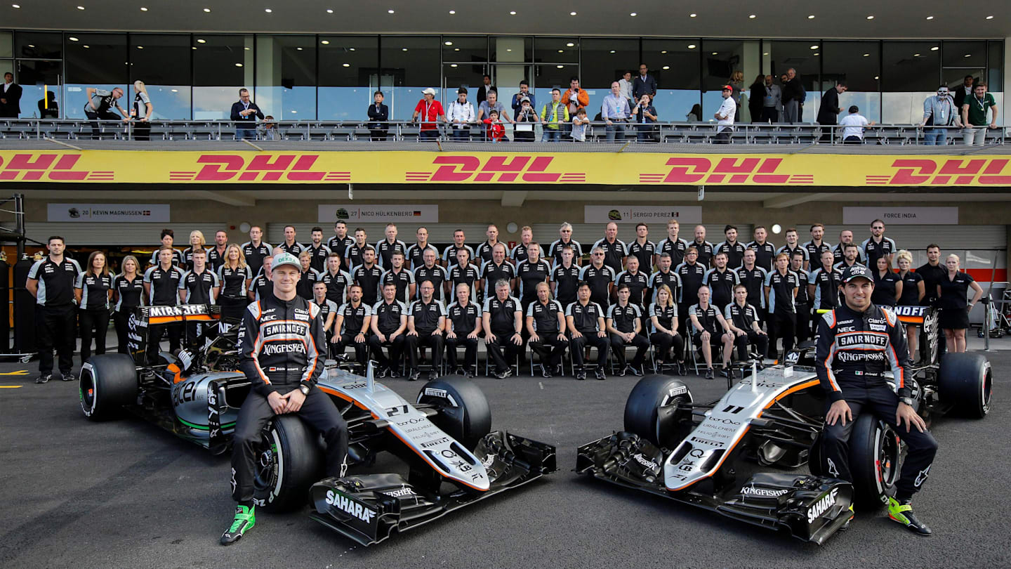Nico Hulkenberg (GER) Force India F1 and Sergio Perez (MEX) Force India at the Force India team