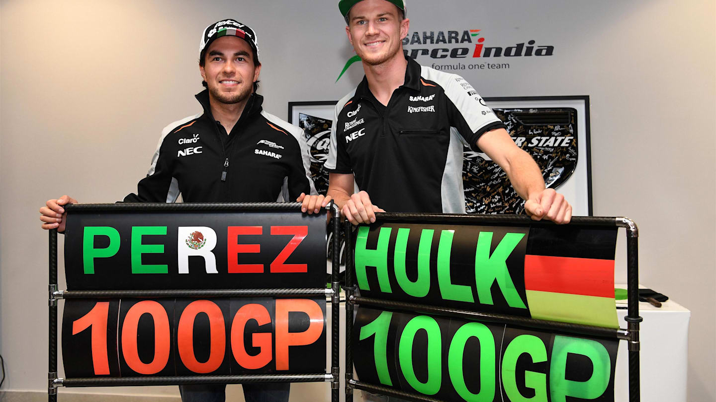 Sergio Perez (MEX) Force India and Nico Hulkenberg (GER) Force India F1 celebrate their 100th