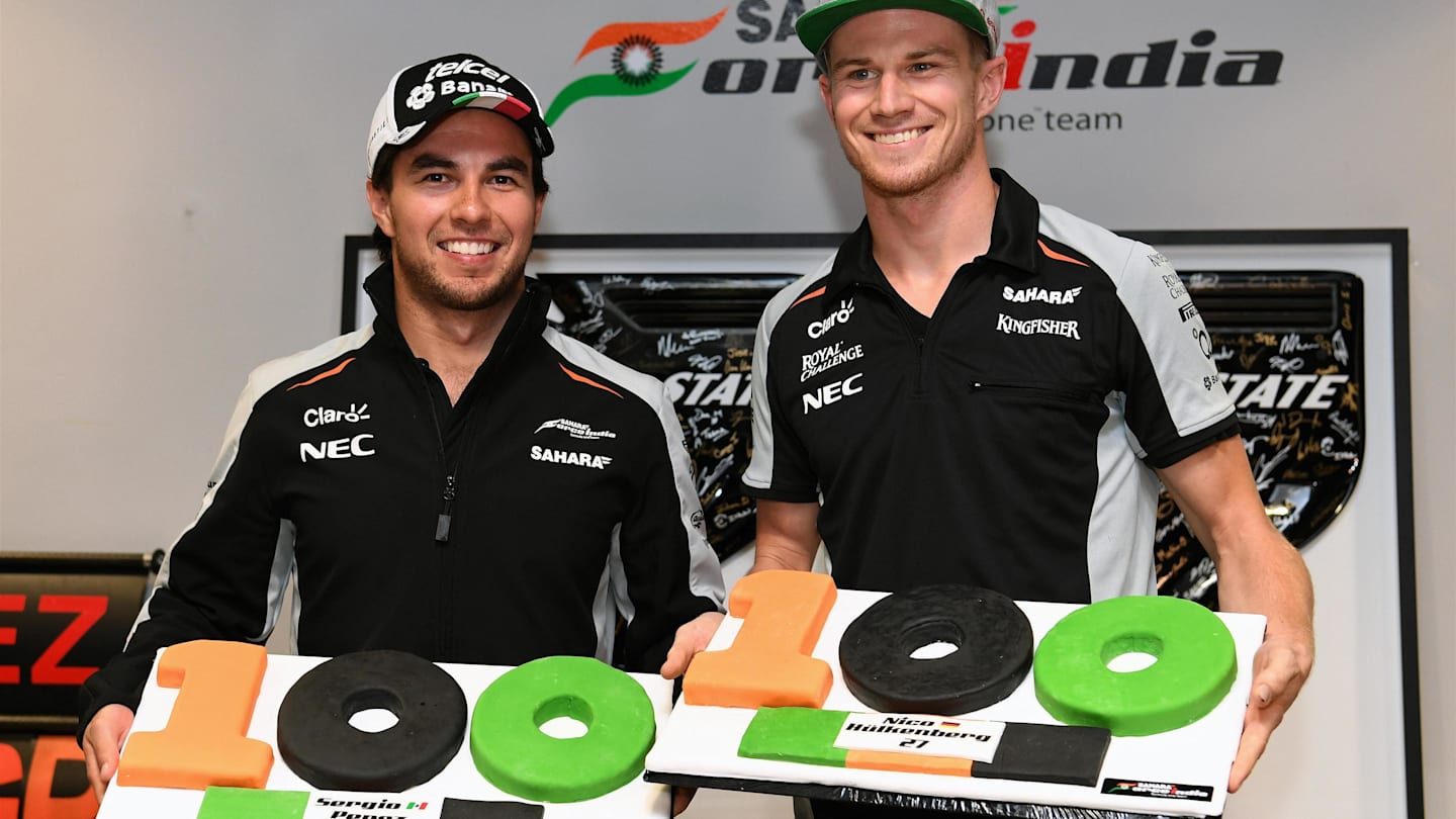 Sergio Perez (MEX) Force India and Nico Hulkenberg (GER) Force India F1 celebrate their 100th