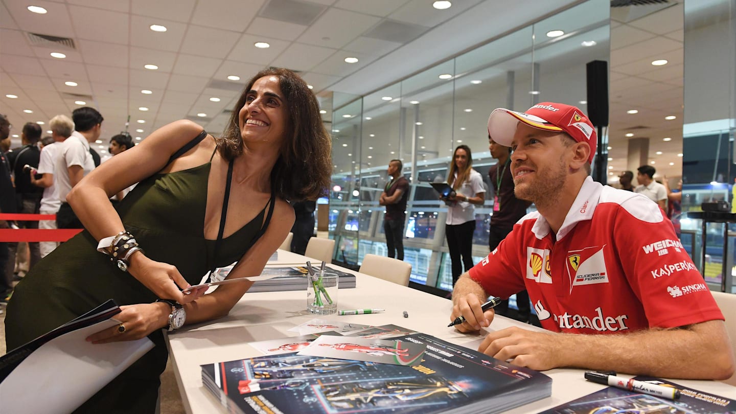 Sebastian Vettel (GER) Ferrari at the fans autograph session at Formula One World Championship,