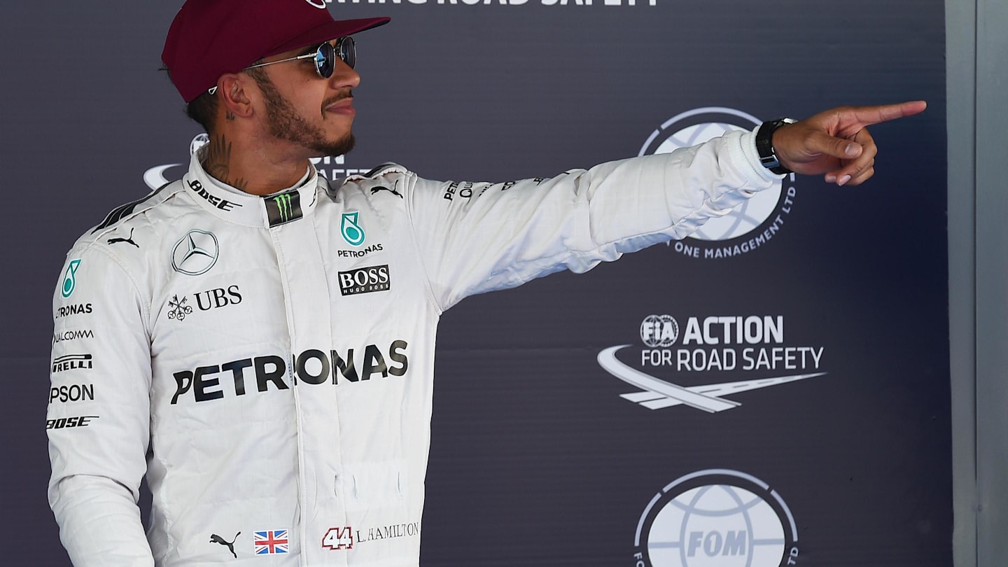 Pole sitter Lewis Hamilton (GBR) Mercedes AMG F1 celebrates in parc ferme at Formula One World