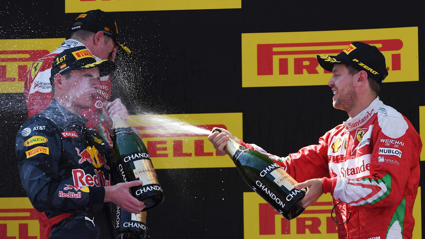 Kimi Raikkonen (FIN) Ferrari, race winner Max Verstappen (NED) Red Bull Racing and Sebastian Vettel