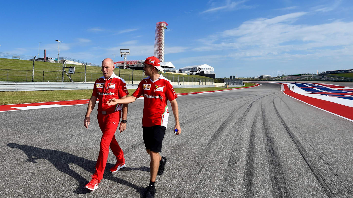 Sebastian Vettel (GER) Ferrari walks the track with Jock Clear (GBR) Ferrari Chief Engineer at