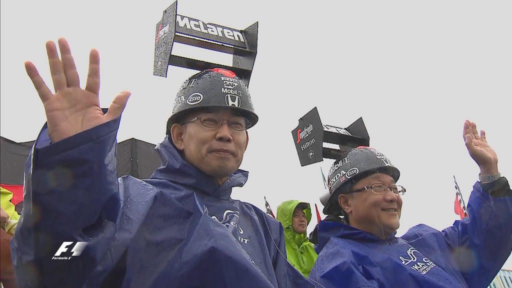 Is that a working DRS rear wing? Diehard Japanese fans brave the rain at Suzuka. © FOWC Ltc