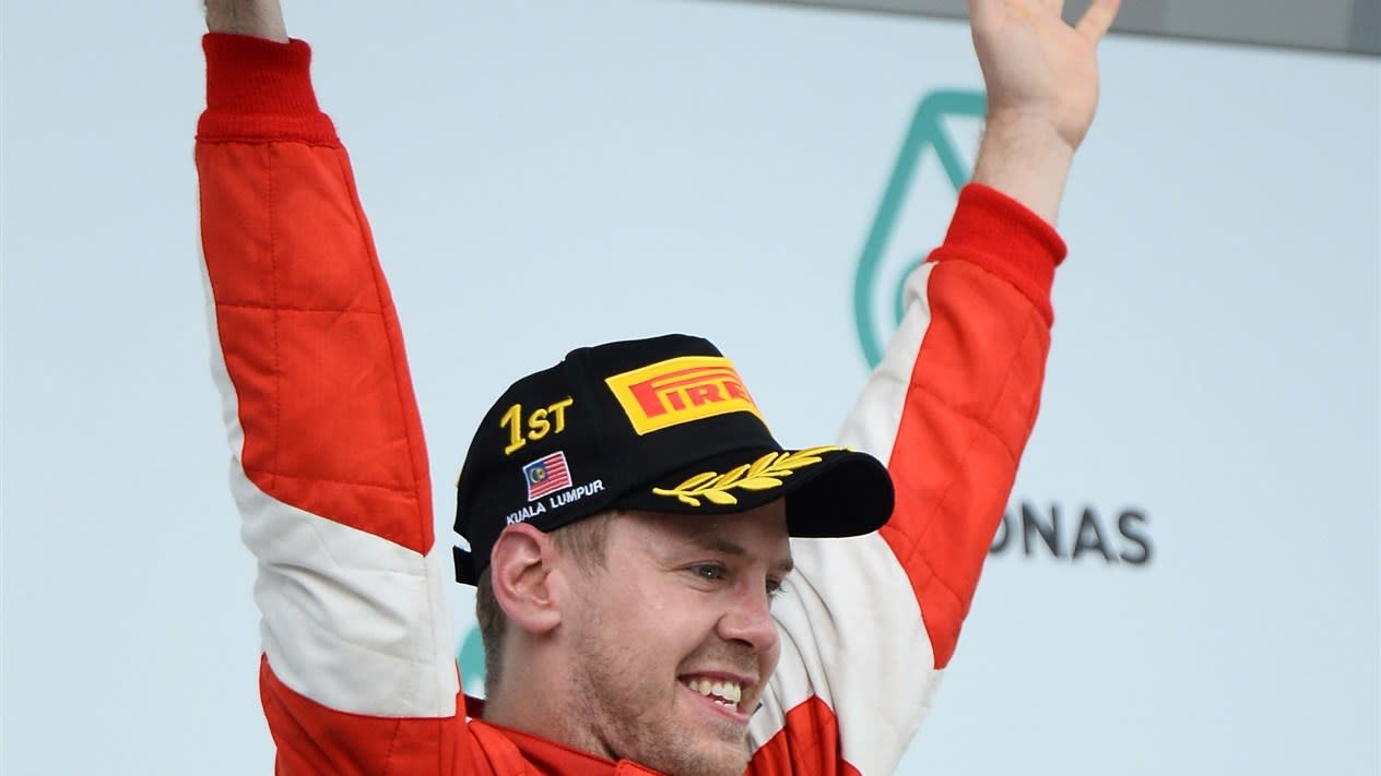 Sebastian Vettel (GER) Ferrari celebrates on the podium at Formula One World Championship, Rd2, Malaysian Grand Prix, Race, Sepang, Malaysia, Sunday 29 March 2015. © Sutton Motorsport Images