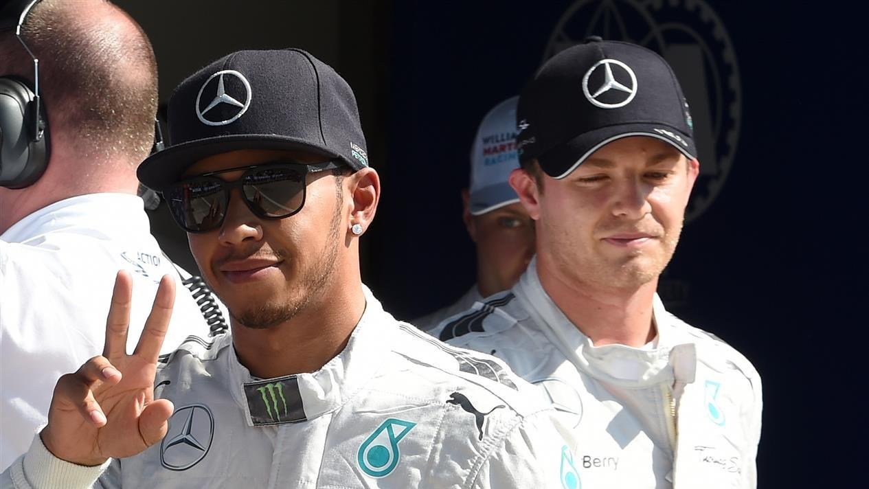 Pole sitter Lewis Hamilton (GBR) Mercedes AMG F1 celebrates in parc ferme. Formula One World Championship, Rd13, Italian Grand Prix, Monza, Italy, Qualifying, Saturday, 6 September 2014 © Sutton Images. No reproduction without permission