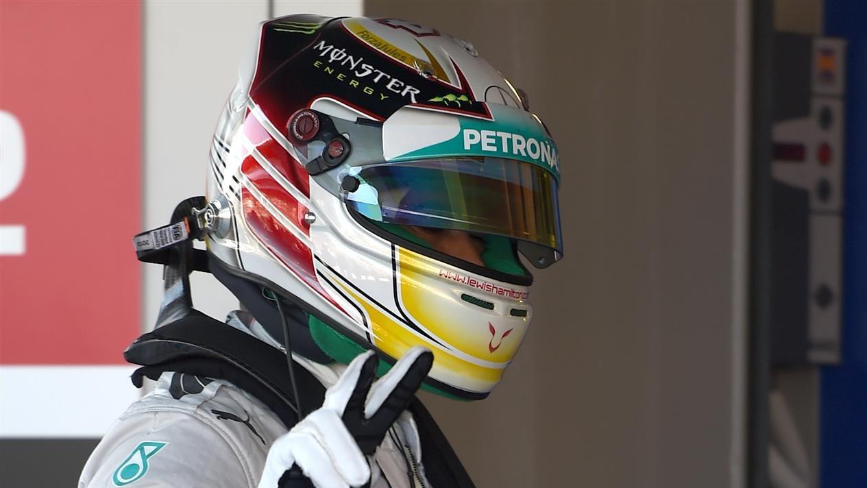 Pole sitter Lewis Hamilton (GBR) Mercedes AMG F1 in parc ferme. Formula One World Championship, Rd16, Russian Grand Prix, Qualifying, Sochi Autodrom, Sochi, Krasnodar Krai, Russia, Saturday, 11 October 2014