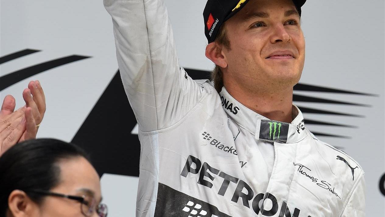 second placed Nico Rosberg (GER) Mercedes AMG F1 celebrates on the podium. Formula One World Championship, Rd4, Chinese Grand Prix, Race, Shanghai, China, Sunday, 20 April 2014. © Sutton Images