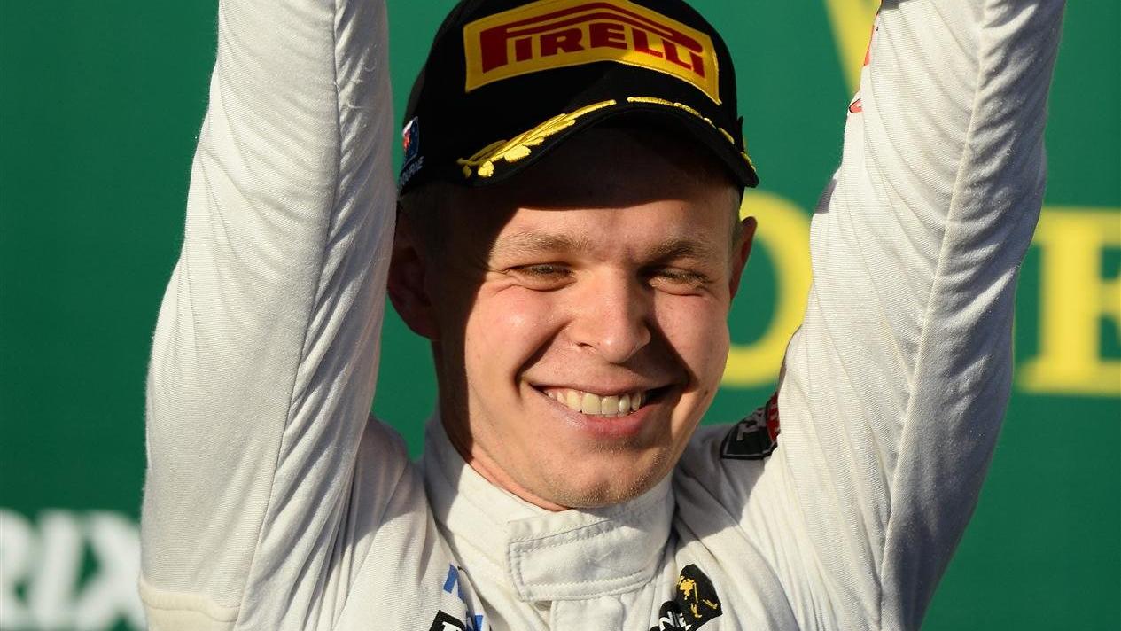 Third placed Kevin Magnussen (DEN) McLaren, with his trophy on the podium. Formula One World Championship, Rd1, Australian Grand Prix, Race, Albert Park, Melbourne, Australia, Sunday, 16 March 2014. © Sutton Images