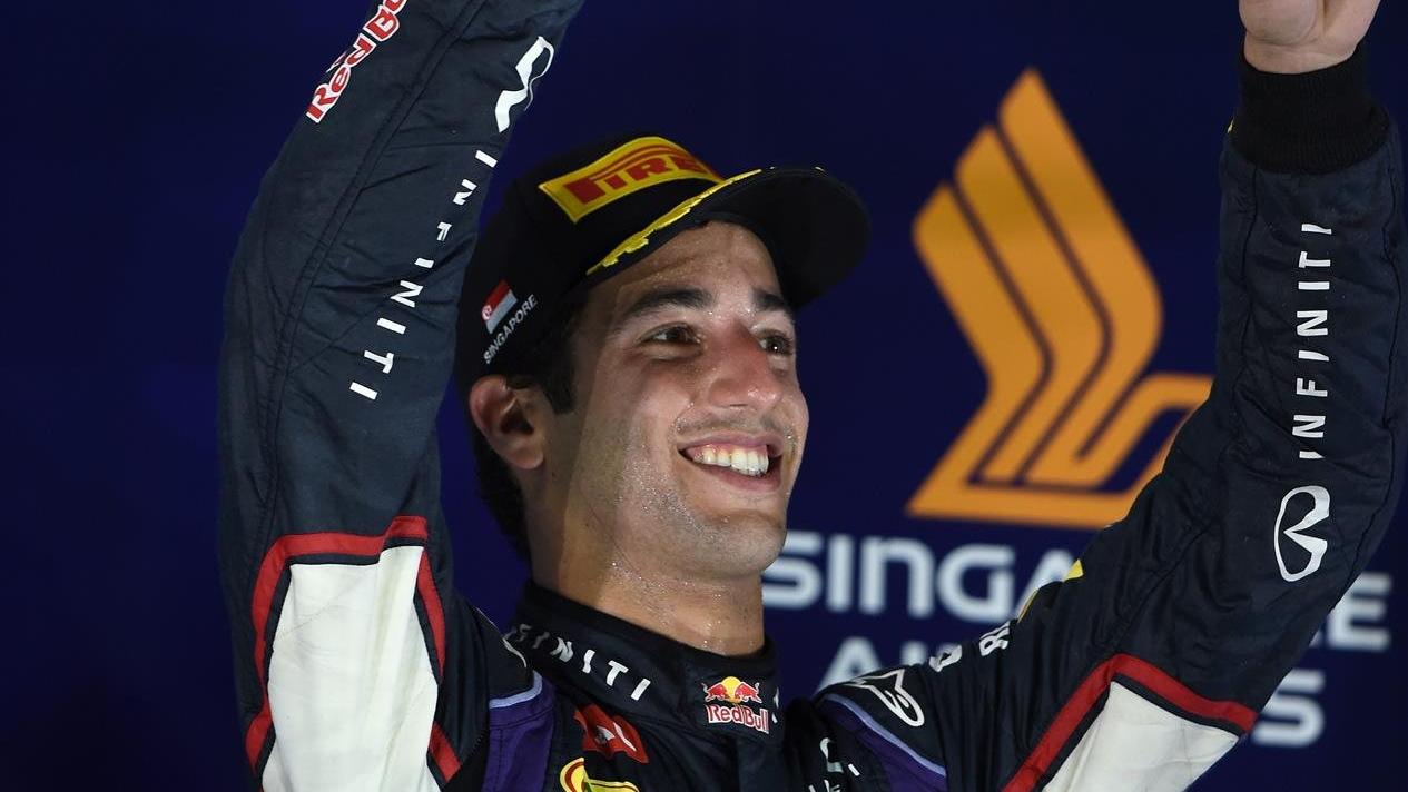 Daniel Ricciardo (AUS) Red Bull Racing celebrates on the podium. Formula One World Championship, Rd14, Singapore Grand Prix, Marina Bay Street Circuit, Singapore, Race Day, Sunday, 21 September 2014
