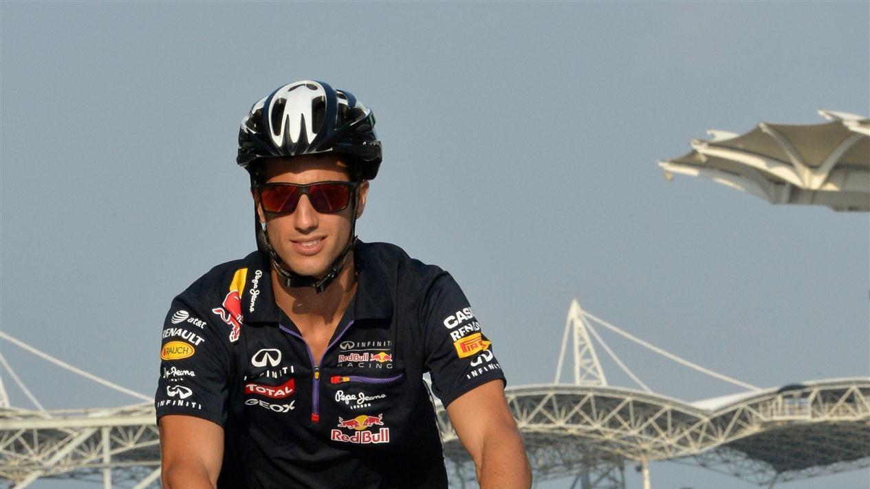 Daniel Ricciardo (AUS) Red Bull Racing cycles the track. Formula One World Championship, Rd2, Malaysian Grand Prix, Preparations, Sepang, Malaysia, Thursday, 27 March 2014