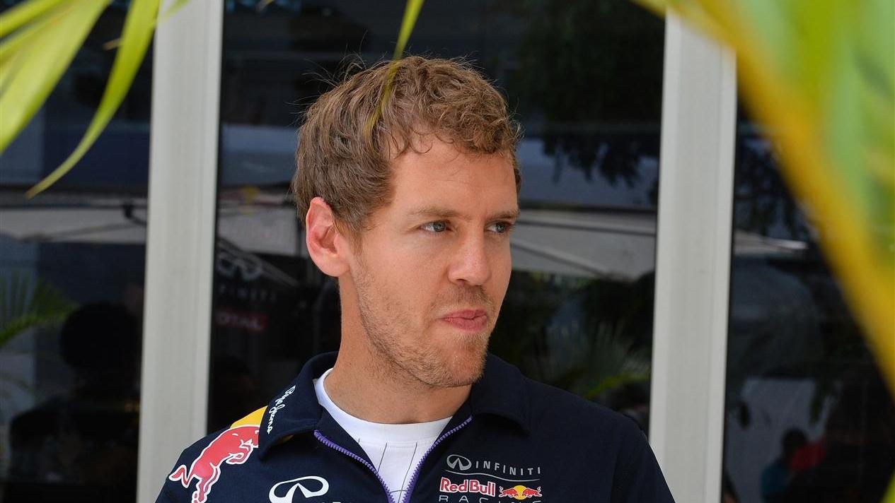 Sebastian Vettel (GER) Red Bull Racing. Formula One World Championship, Rd2, Malaysian Grand Prix, Practice, Sepang, Malaysia, Friday, 28 March 2014