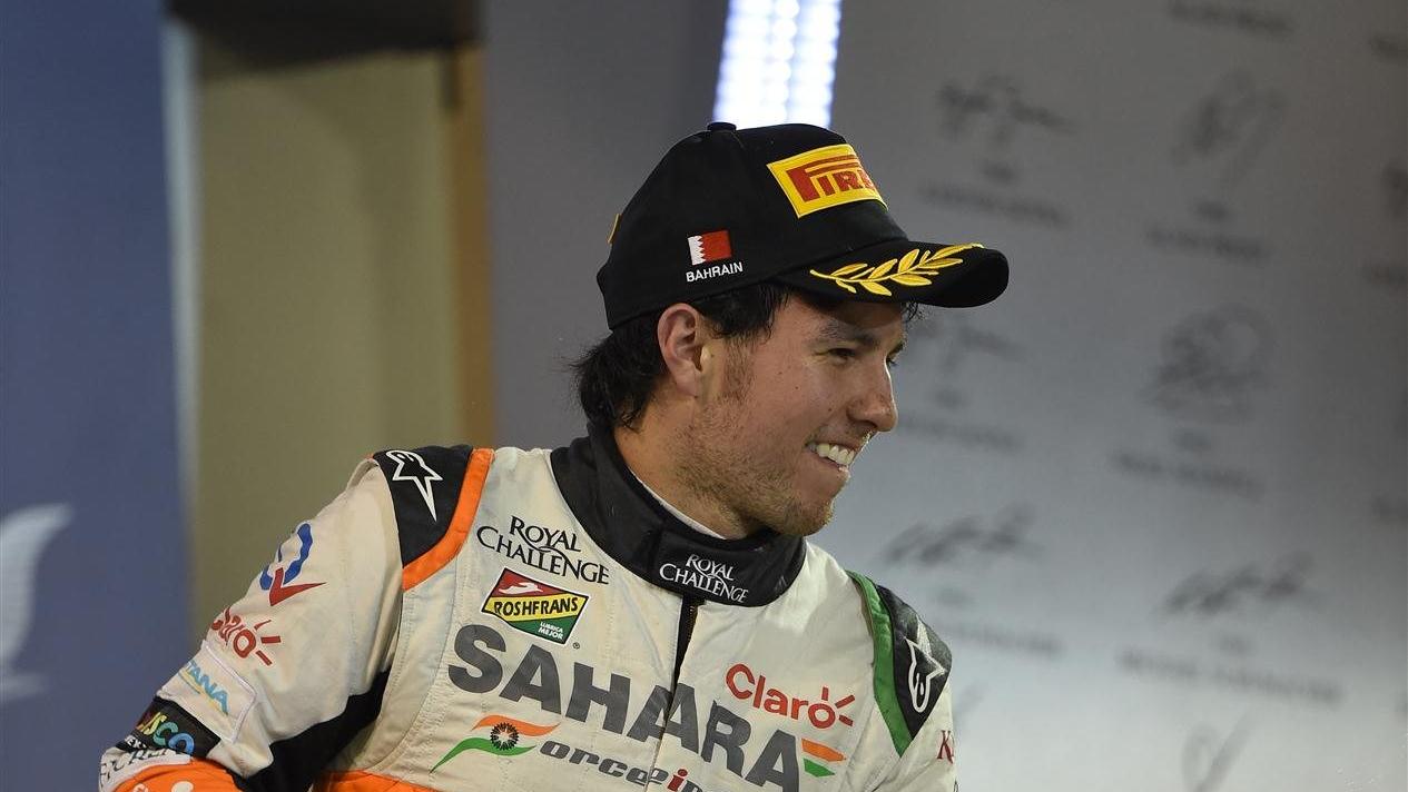 Sergio Perez (MEX) Force India celebrates on the podium. Formula One World Championship, Rd3, Bahrain Grand Prix, Race, Bahrain International Circuit, Sakhir, Bahrain, Sunday, 6 April 2014