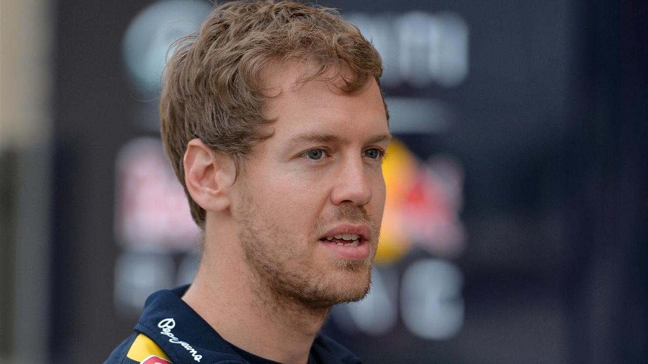 Sebastian Vettel (GER) Red Bull Racing. Formula One World Championship, Rd3, Bahrain Grand Prix, Preparations, Bahrain International Circuit, Sakhir, Bahrain, Thursday, 3 April 2014