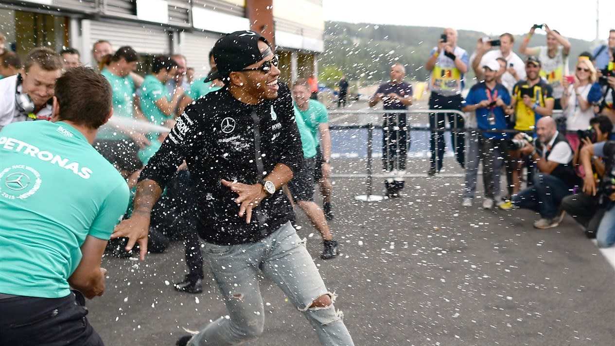 Lewis Hamilton (GBR) Mercedes AMG F1 celebrates with the team at Formula One World Championship, Rd10, Hungarian Grand Prix, Race, Hungaroring, Hungary, Sunday 26 July 2015. © Sutton Motorsport Images