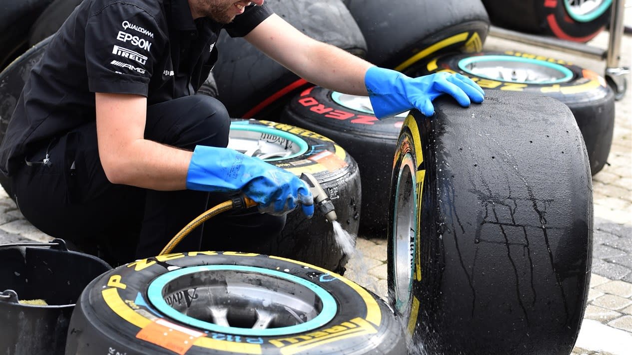Mercedes AMG F1 mechanic washes pit tyres and wheels at Formula One World Championship, Rd15, Russian Grand Prix, Qualifying, Sochi Autodrom, Sochi, Krasnodar Krai, Russia, Saturday 10 October 2015. © Sutton Motorsport Images