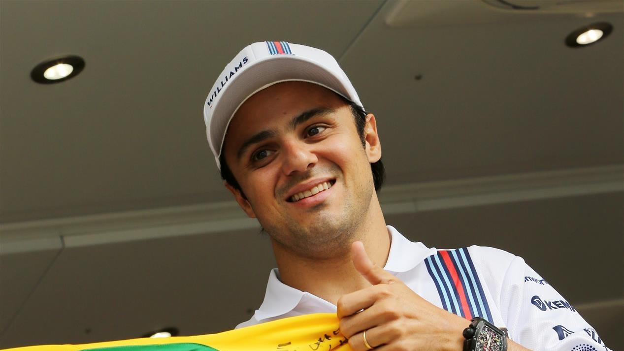 elipe Massa (BRA) Williams with a signed Brazilian football shirt. Formula One World Championship, Rd9, British Grand Prix, Preparations, Silverstone, England, Thursday, 3 July 2014 © Sutton Images. No reproduction without permission