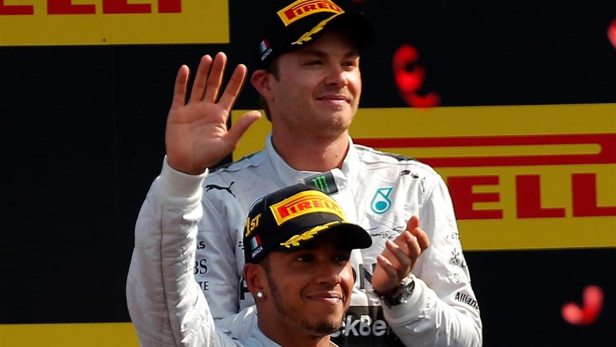 Race winner Lewis Hamilton (GBR) Mercedes AMG F1, on the podium with second placed Nico Rosberg (GER) Mercedes AMG F1. Formula One World Championship, Rd13, Italian Grand Prix, Monza, Italy, Race Day, Sunday, 7 September 2014