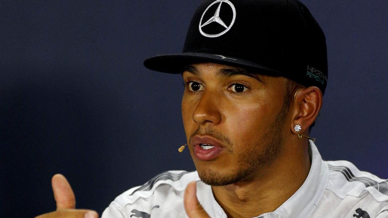 Lewis Hamilton (GBR) Mercedes AMG F1 in the post-qualifying Press Conference. Formula One World Championship, Rd14, Singapore Grand Prix, Marina Bay Street Circuit, Singapore, Qualifying, Saturday, 20 September 2014