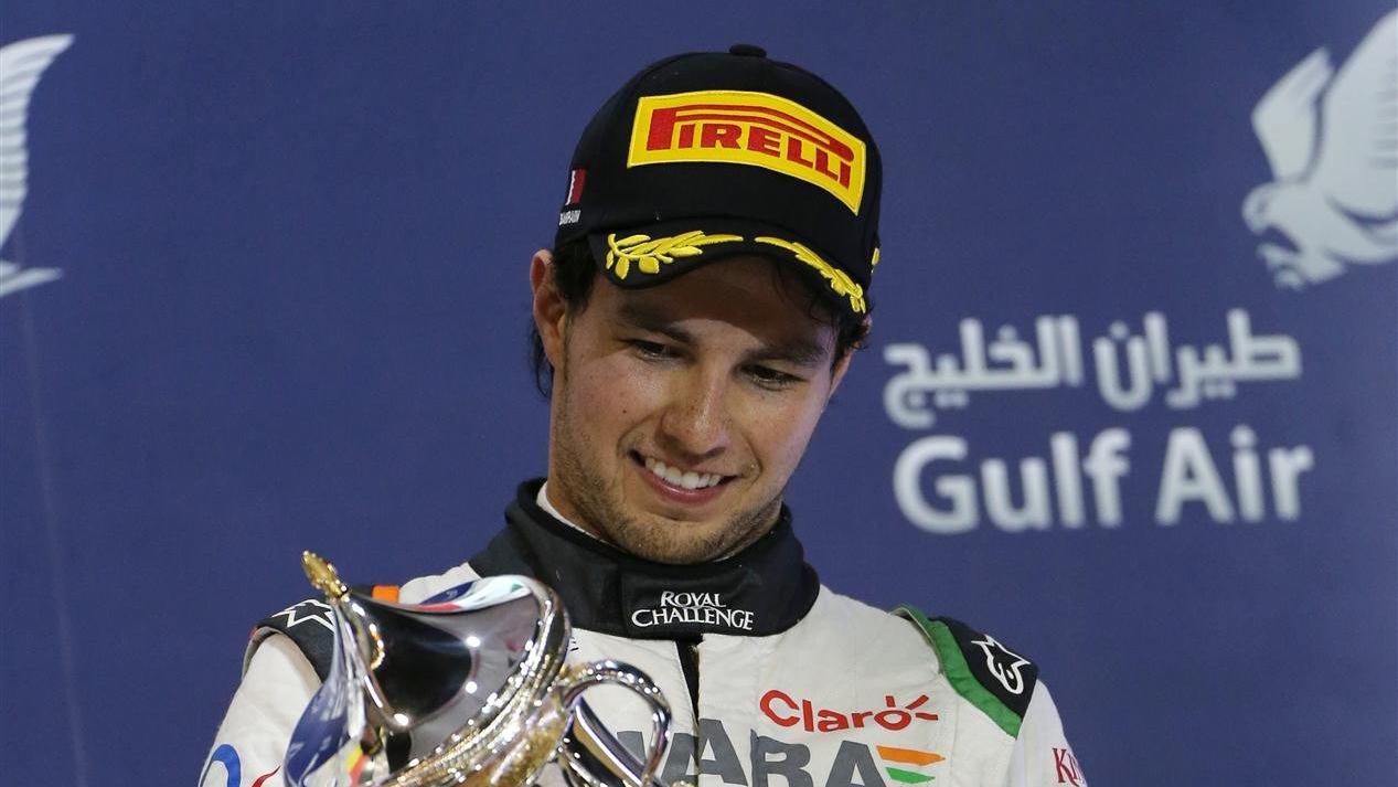 Sergio Perez (MEX) Force India celebrates on the podium. Formula One World Championship, Rd3, Bahrain Grand Prix, Race, Bahrain International Circuit, Sakhir, Bahrain, Sunday, 6 April 2014