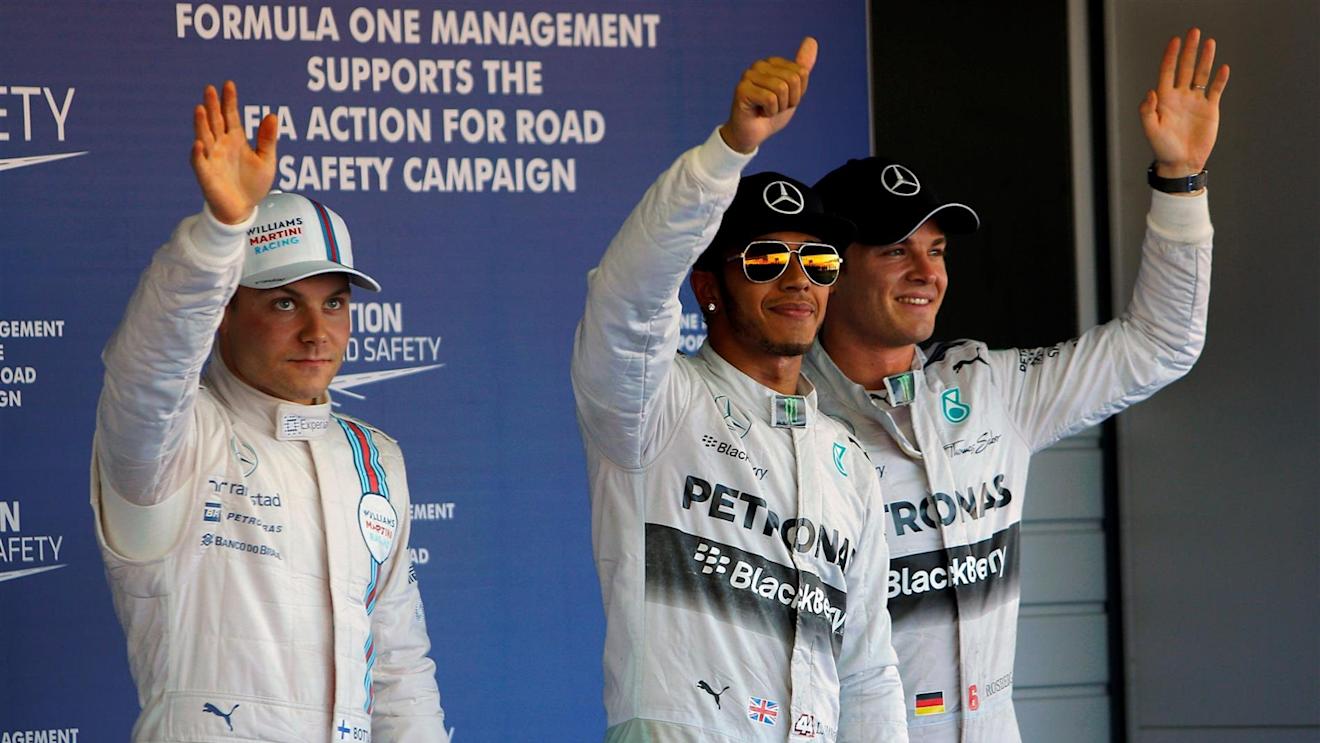(L to R): Valtteri Bottas (FIN) Williams, pole sitter Lewis Hamilton (GBR) Mercedes AMG F1 and Nico Rosberg (GER) Mercedes AMG F1 celebrate in parc ferme. Formula One World Championship, Rd16, Russian Grand Prix, Qualifying, Sochi Autodrom, Sochi, Krasnodar Krai, Russia, Saturday, 11 October 2014 © Sutton Images. No reproduction without permission
