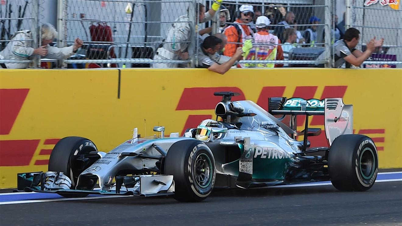 Race winner Lewis Hamilton (GBR) Mercedes AMG F1 W05 crosses the line. Formula One World Championship, Rd16, Russian Grand Prix, Race, Sochi Autodrom, Sochi, Krasnodar Krai, Russia, Sunday, 12 October 2014 © Sutton Images. No reproduction without permission