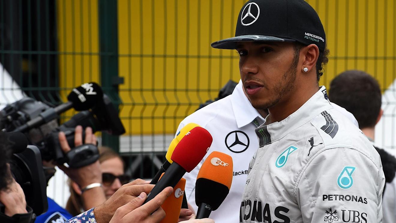Lewis Hamilton (GBR) Mercedes AMG F1 is interviewed by the media. Formula One World Championship, Rd18, Brazilian Grand Prix, Qualifying, Sao Paulo, Brazil, Saturday, 8 November 2014 