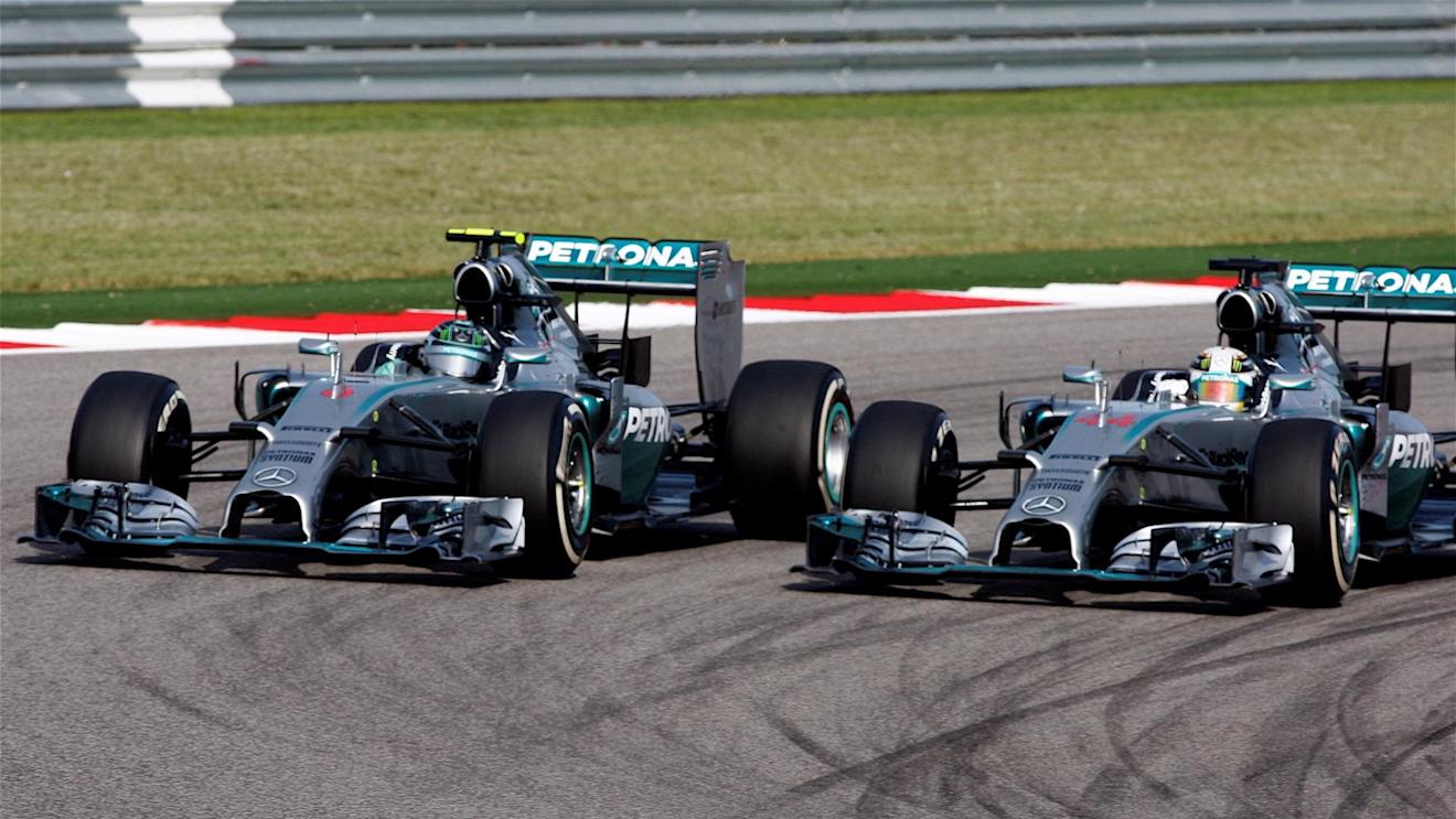 Lewis Hamilton (GBR) Mercedes AMG F1 W05 overtakes Nico Rosberg (GER) Mercedes AMG F1 W05 for the lead. Formula One World Championship, Rd17, United States Grand Prix, Race, Austin, Texas, USA, Sunday, 2 November 2014