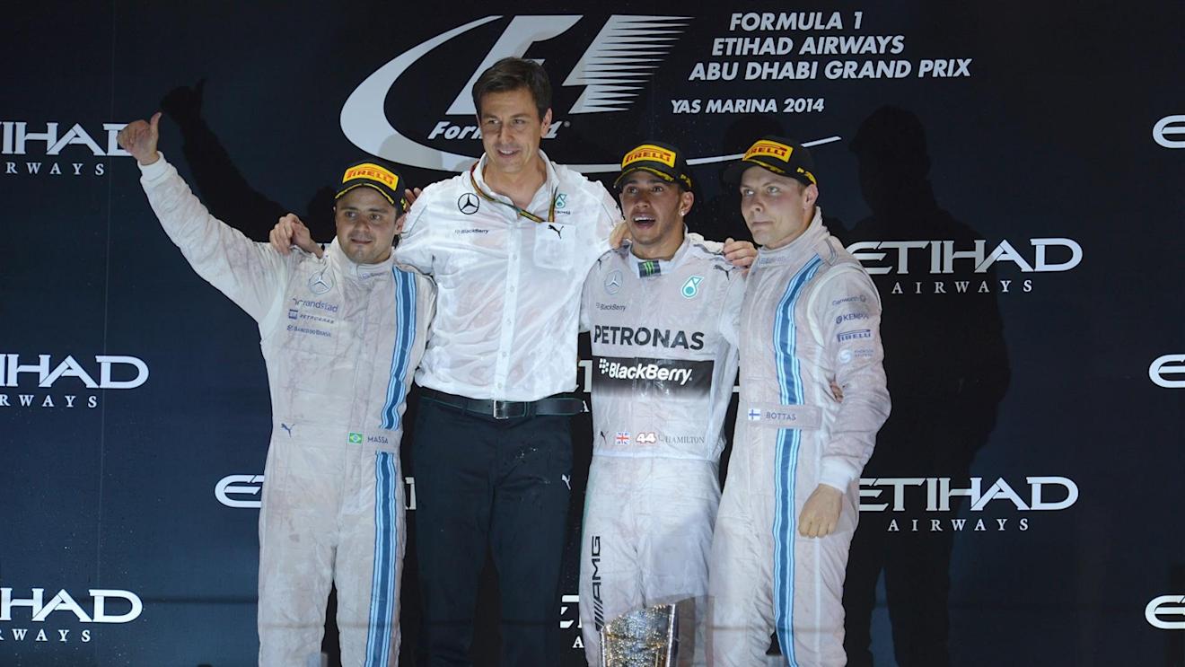 (L to R): Felipe Massa (BRA) Williams, Toto Wolff (AUT) Mercedes AMG F1 Director of Motorsport, race winner Lewis Hamilton (GBR) Mercedes AMG F1 and Valtteri Bottas (FIN) Williams celebrates on the podium. Formula One World Championship, Rd19, Abu Dhabi Grand Prix, Race, Yas Marina Circuit, Abu Dhabi, UAE, Sunday, 23 November 2014