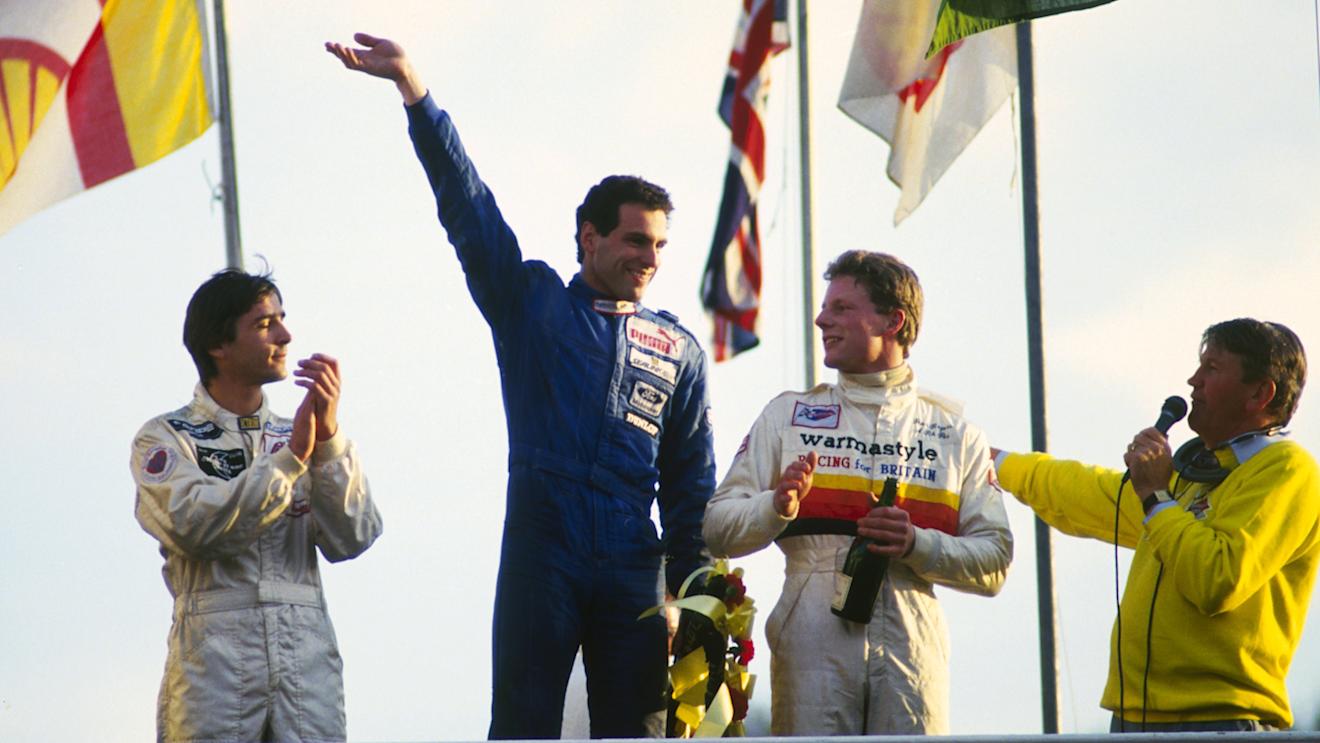 The podium (L to R): Philippe Favre (SUI); Roland Ratzenberger (AUT) Van Diemen, race winner; Peter Rogers (GBR); Brian Jones (GBR) the Brands Hatch commentator. British Formula Ford Festival, Brands Hatch, England, 24-26 October 1986.