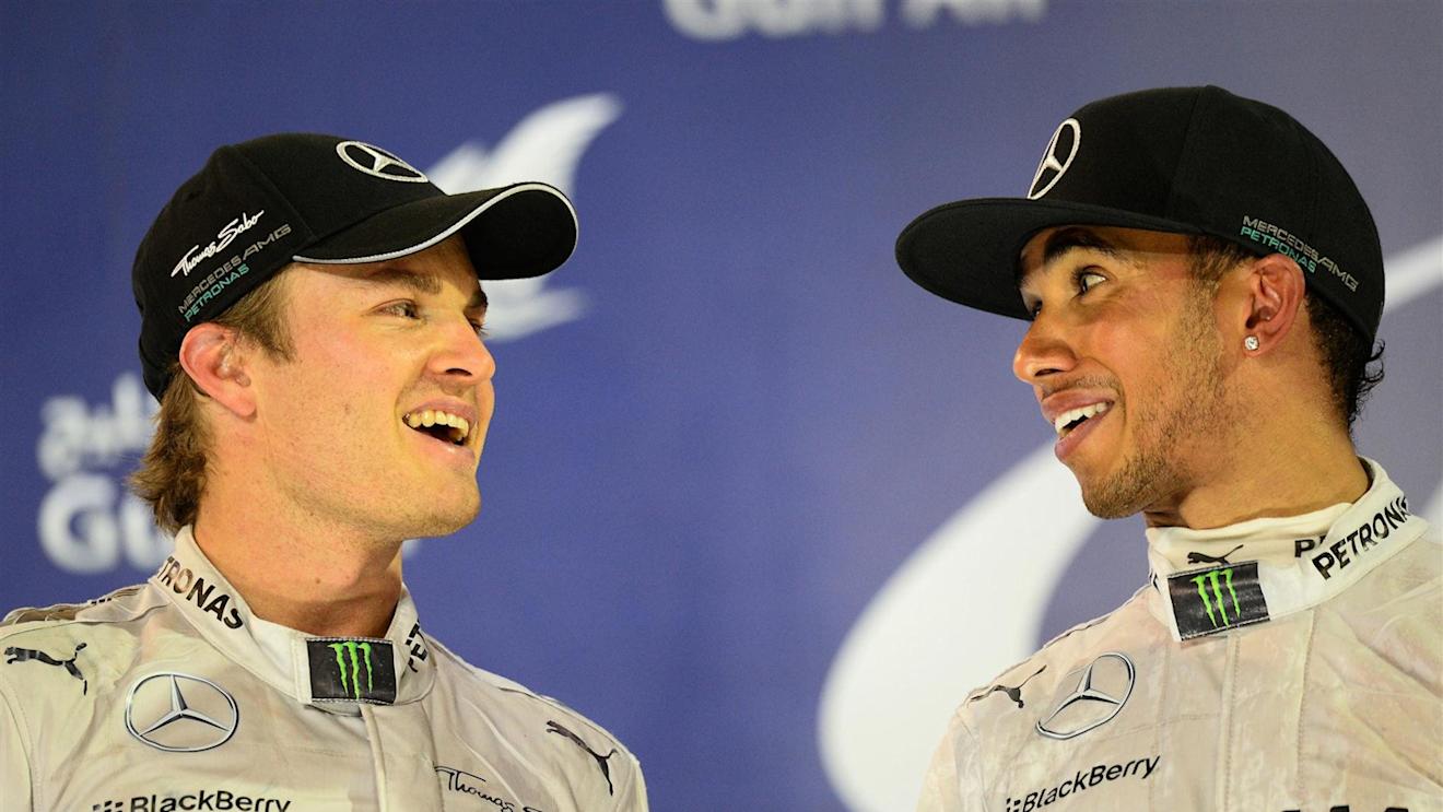 Nico Rosberg (GER) Mercedes AMG F1 and Lewis Hamilton (GBR) Mercedes AMG F1 on the podium. Formula One World Championship, Rd3, Bahrain Grand Prix, Race, Bahrain International Circuit, Sakhir, Bahrain, Sunday, 6 April 2014